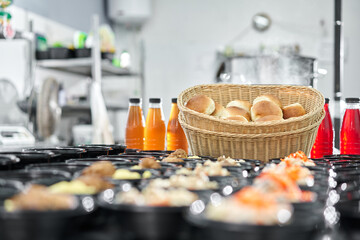 Row of plastic disposable lunch box with healthy natural food. Soups, cream soup, main course with side dish, salads. Food delivery. Lunch in the office.