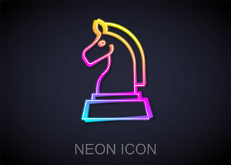 Glowing neon line Chess icon isolated on black background. Business strategy. Game, management, finance. Vector