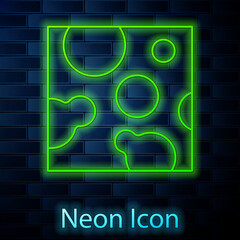 Glowing neon line Cheese icon isolated on brick wall background. Vector