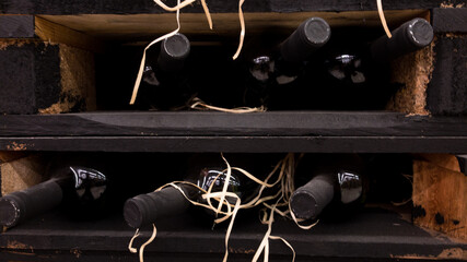 Wine Elegance: A Captivating Collection of Fine Bottles Nestled in Rustic Wooden Crates, Perfect...