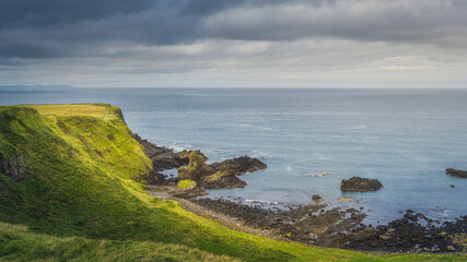 Rock formations of Giants Causeway, seen from the top of the cliff, part of Wild Atlantic Way and...