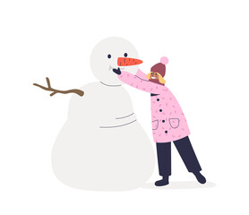 Girl making snowman. Little kid enjoy funny outdoor activities in winter season having fun