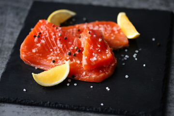 Fresh red fish. Salmon with spices. Fish for sushi.