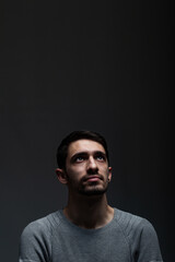 Obraz premium Portrait of young handsome male with beard wearing blouse