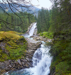 Fototapeta na wymiar Famous waterfalls in the Austrian mountains. (Krimmler Waterfalls)