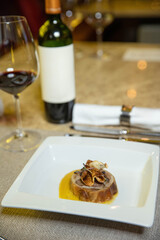 Food served, with wine, on a plate in luxury restaurant