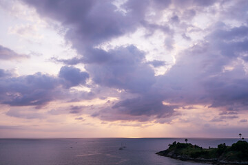Fototapeta premium Fantastic clouds over tropical sea at sunset evening time