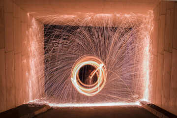 Steel wool photograph framed in tunnel