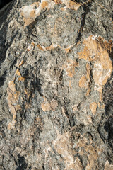 Grunge stone mountain texture. Abstract rocks background. The texture of the stone wall close-up