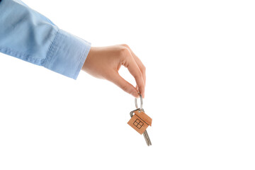 Obraz premium Real estate agent holding key with house shaped keychain on white background