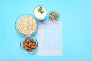 Meal plan and healthy products on color background