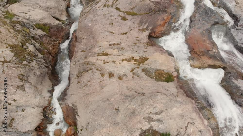 Wall mural Aerial view looking down on a Shdugra Waterfall in Caucasus mountains in Georgia