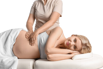 Obraz na płótnie Canvas Young pregnant woman having massage against white background