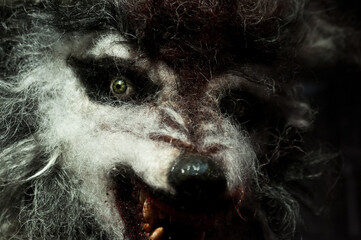 Halloween monster werewolf mask with bloody teth. scary grin