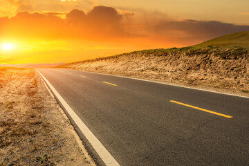 Empty asphalt road and beautiful cloud landscape at sunset.