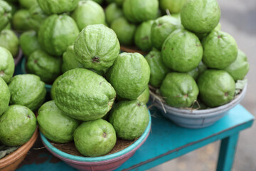 Bunch of guava tropical fruits in market	
