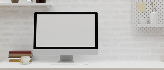 Modern working desk with computer mockup and copy space for montage in white brick wall.
