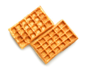 Tasty Belgian waffles on white background