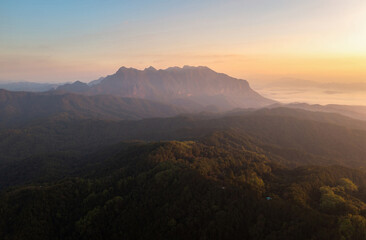 Obraz na płótnie Canvas Aerial View of Doi Luang Chiang Dao Mountains in the morning and the sea of mist, Doi Mae Taman, San Pa Kia. Chiang Mai Province, Thailand. Camping.
