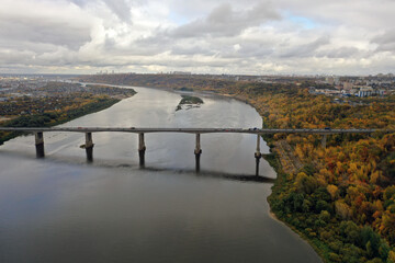 Transport bridge across the river. Nizhny Novgorod, Myzinsky bridge. Aerial photography of the...