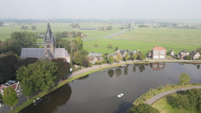 Aerial view of Amstelveen Oudekerk ad Amstel typical dutch landscape and historic village along the Amstel river in The Netherlands.