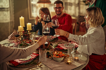 Family making a toast at a dining table