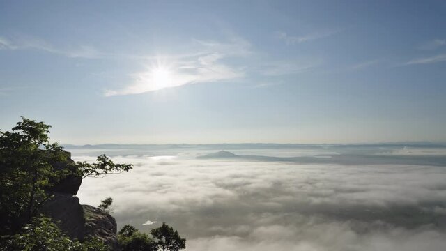 Tranquil Scene sunrise and Slow moving over the mountain. Khao Phra Ya Dern Thong View Point, Lop Buri, Thailand
