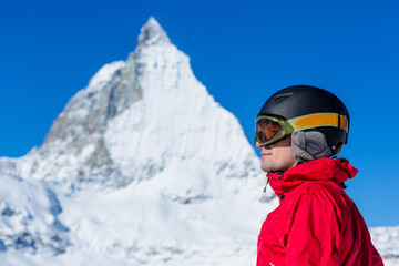 Close portrait of skier man. Italian Alps. Matterhorn