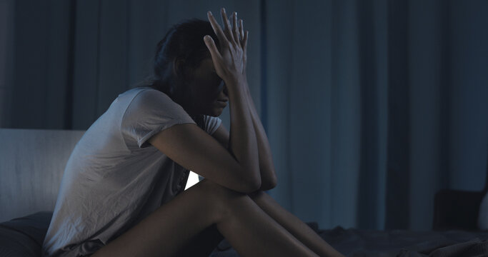 Sad woman suffering from insomnia