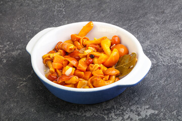 Marinated pickled honey mushrooms in the bowl