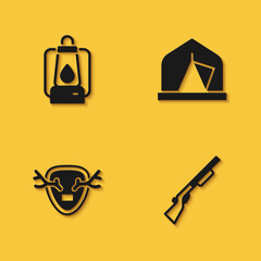 Set Camping lantern, Hunting gun, Deer antlers on shield and Tourist tent icon with long shadow. Vector