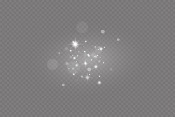 Dust sparks and stars shine with a special light. Christmas light effect. Glittering particles of magic dust.Vector sparkles on a transparent background.