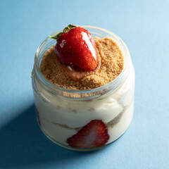 strawberry dessert in glass bowl