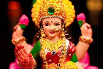 Beautiful Clay Idol of Hindu Goddess Lakshmi for diwali festival.