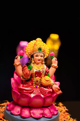 Beautiful Clay Idol of Hindu Goddess Lakshmi for diwali festival.