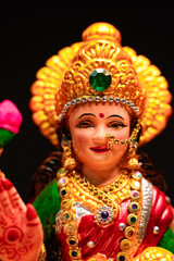 Beautiful Clay Idol of Hindu Goddess Lakshmi for diwali festival.