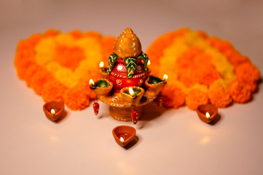 Traditional oil lamps with flower decoration for indian festival diwali.