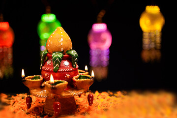 Traditional oil lamps with flower decoration for indian festival diwali.