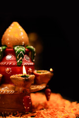 Traditional oil lamps with flower decoration for indian festival diwali.