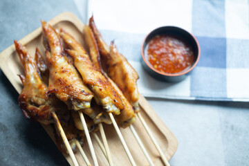 Grilled chicken wings, the local Thai food.