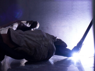 Welder. Welding work in production.