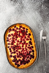 Raspberry pie with curd filling in an oval shape, top view