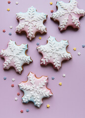 Christmas gingerbread cookies on pink background