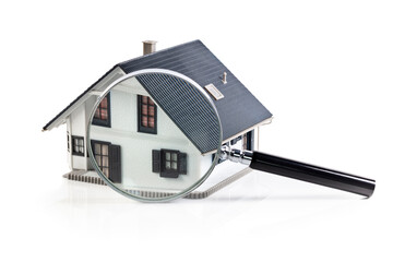 House model with magnifying glass home inspection or searching for a house - 464977386
