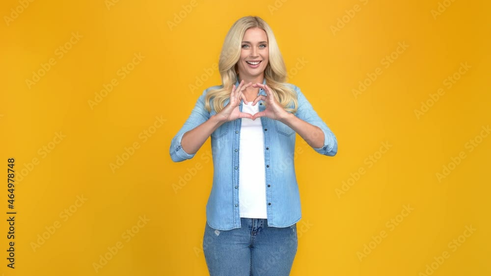 Canvas Prints Dream nice blonde lady demonstrate heart figure shape gesture