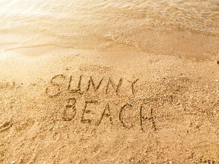 The inscription Sunny beach