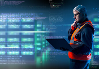 IT specialist. Server maintenance worker. Hosting administrator man. He is holding laptop and...