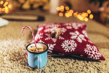 Mug with hot chocolate or cocoa.Concept of a cozy Christmas