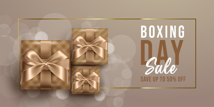 Realistic boxing day sale banner on luxury background