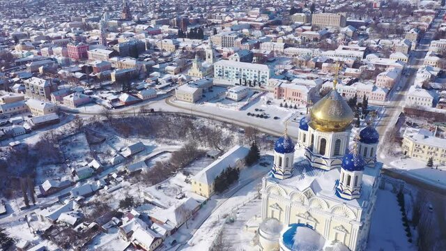 Scenic aerial view of main Orthodox church in Russian city of Yelets, five domed Ascension Cathedral on sunny winter day